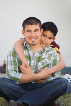 Father and son hugging