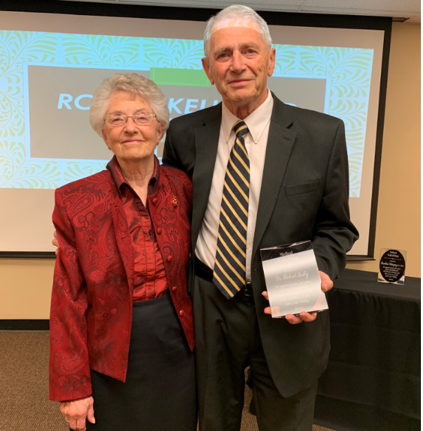 Dr. Robert Kelly and Martha Kelly accepting their award.