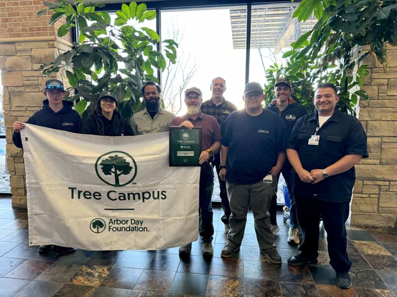 The SLV Health Tree Committee poses with their recognition plaque. 