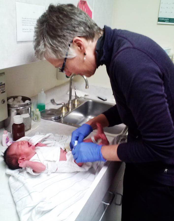 Dr. Bethany Kolb is shown helping out in the Labor and Delivery Department, as the team delivered 17 babies in one week.