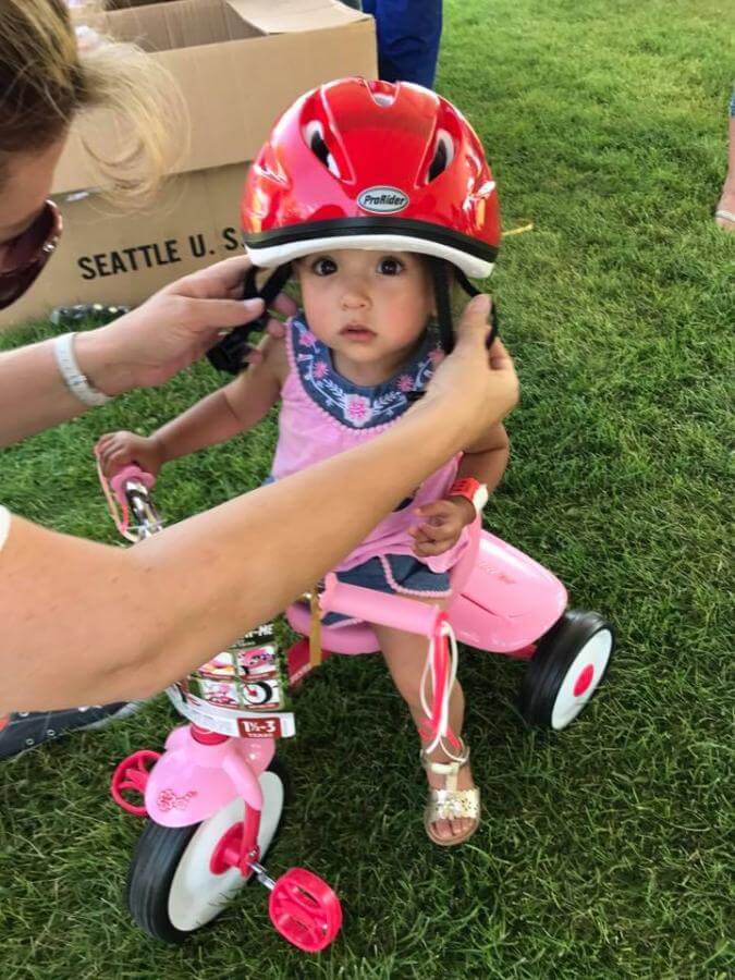 Girl with bike helmet 