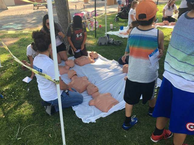 People practicing CPR