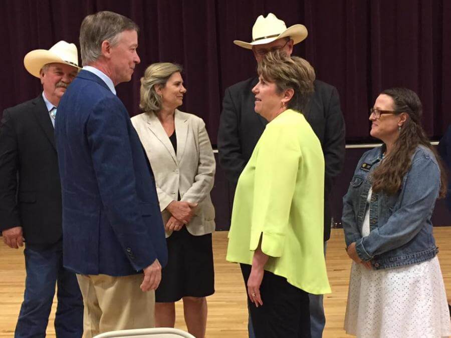 Visiting with Governor Hickenlooper after the signing ceremony are SLVH CEO Konnie Martin, Senators Crowder, Grantham and Esgar along with the Director of the Colorado Health Care Policy and Finance, Sue Birch.