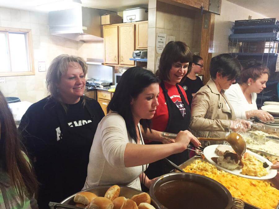 Employees of San Luis Valley Health volunteer at La Puente.