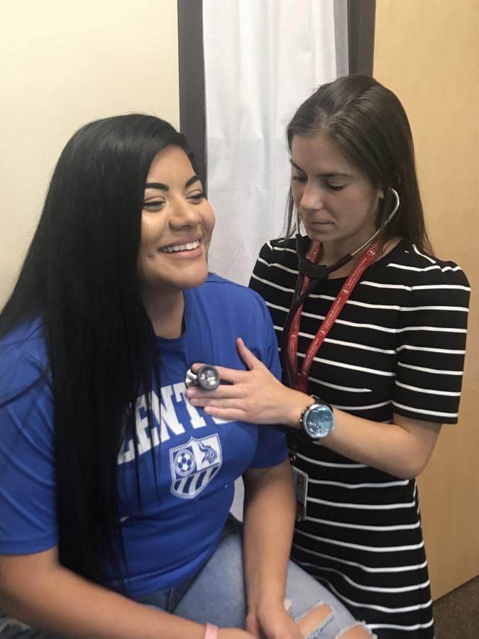 Elisa screening a student