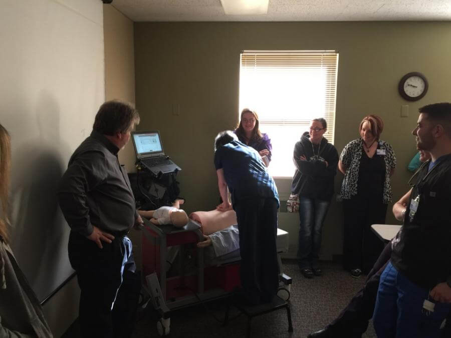 SLV Health Employees take turns testing their skills on the resuscitation simulation