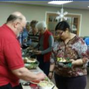 Group of volunteers serving meals